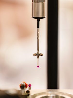 Precision measuring industry machine working in factory, close up